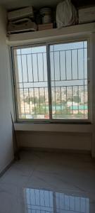 Bedroom Image of 950 Sq.ft 1 BHK Apartment / Flat for rent in Mayuri Infinity, Handewadi Pune for Rs. 18000