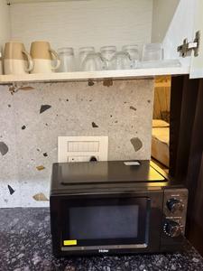 Kitchen Image of 400 Sq.ft 1 BHK Studio for rent in DLF Capital Greens Phase 1 And 2, Karampura New Delhi for Rs. 25000