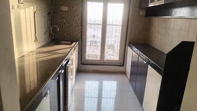 Kitchen Image of 1100 Sq.ft 2 BHK Apartment / Flat for rent in Proviso Sai Proviso Aashlesha, Kopar Khairane Navi Mumbai for Rs. 60000