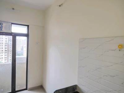 Kitchen Image of 700 Sq.ft 1 BHK Apartment / Flat for rent in Raunak Heights, Kasarvadavali Thane for Rs. 16500