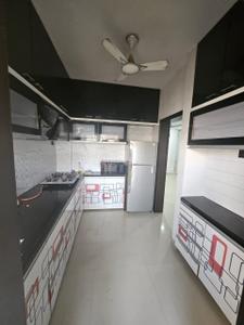 Kitchen Image of 1350 Sq.ft 2 BHK Apartment / Flat for rent in Satyamev Famosa, Sargasan Gandhinagar for Rs. 26000