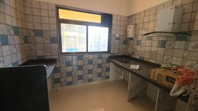Kitchen Image of 1100 Sq.ft 2 BHK Apartment / Flat for rent in Paradise Sai Icon, Kharghar Navi Mumbai for Rs. 35000