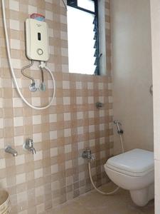 Common Bathroom Image of 1025 Sq.ft 2 BHK Apartment / Flat for sale in Raunak Unnathi Woods Phase 3, Kasarvadavali Thane for Rs. 9200000