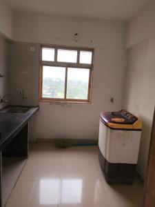 Kitchen Image of 650 Sq.ft 1 BHK Apartment / Flat for rent in Patel Elysium, Ambernath East Ambernath for Rs. 9000