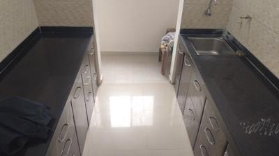 Kitchen Image of 1041 Sq.ft 2 BHK Apartment / Flat for rent in KUL Ecoloch, Mahalunge Pune for Rs. 25000