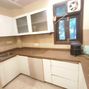 Kitchen Image of 1000 Sq.ft 2 BHK Builder Floor for sale in Lajpat Nagar New Delhi for Rs. 19500000