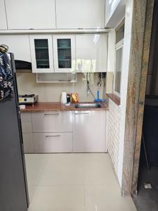 Kitchen Image of 900 Sq.ft 2 BHK Apartment / Flat for rent in Puraniks Aldea, Mahalunge Pune for Rs. 40000