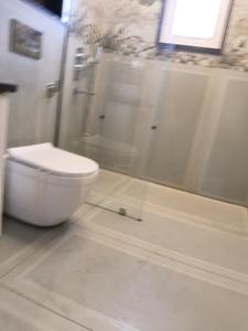 Common Bathroom Image of 2700 Sq.ft 4 BHK Builder Floor for sale in Sunder Luxury Floors Sushant Lok 2, Sector 57 Gurgaon for Rs. 37000000