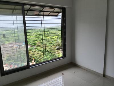 Bedroom Image of 489 Sq.ft 1 BHK Apartment / Flat for rent in Rustagi Aarambha, Titwala Thane for Rs. 7000
