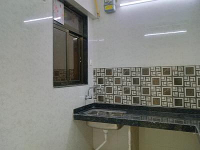 Kitchen Image of 930 Sq.ft 2 BHK Apartment / Flat for sale in Mohan Precious Greens Phase I, Ambernath East Ambernath for Rs. 4500000