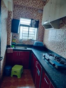 Kitchen Image of 1015 Sq.ft 2 BHK Apartment / Flat for rent in Loharuka Green Enclave, Rajarhat Kolkata for Rs. 25000