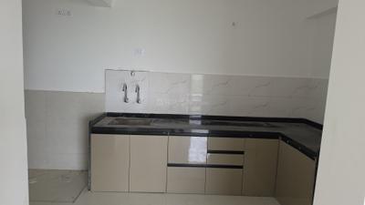 Kitchen Image of 898 Sq.ft 2 BHK Apartment / Flat for rent in Shaligram Pavillia, Gahunje Pune for Rs. 18000