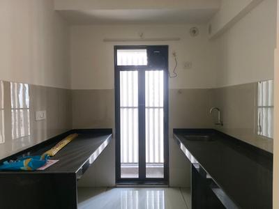 Kitchen Image of 694 Sq.ft 1 BHK Apartment / Flat for sale in Runwal Garden Apartments, Dombivli East Thane for Rs. 3600000
