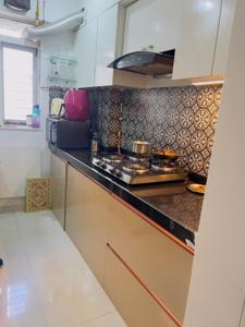 Kitchen Image of 650 Sq.ft 1 BHK Apartment / Flat for rent in Lodha Amara, Kolshet Thane for Rs. 32000
