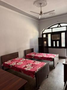 Bedroom Image of Home Away PG in Alpha I, Greater Noida