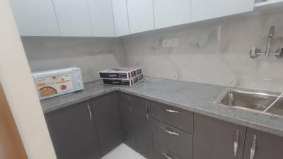 Kitchen Image of 900 Sq.ft 1 BHK Builder Floor for rent in Sector 57 Gurgaon for Rs. 35000