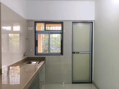 Kitchen Image of 551 Sq.ft 1 BHK Apartment / Flat for sale in Cosmos Meluha, Khidkali Thane for Rs. 4300000
