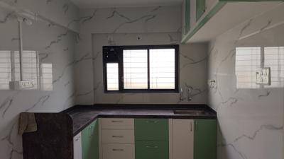 Kitchen Image of 870 Sq.ft 2 BHK Apartment / Flat for sale in Pimple Gurav Pune for Rs. 8300000