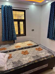 Bedroom Image of 500 Sq.ft 2 BHK Builder Floor for rent in Sector 17 Rohini New Delhi for Rs. 22000
