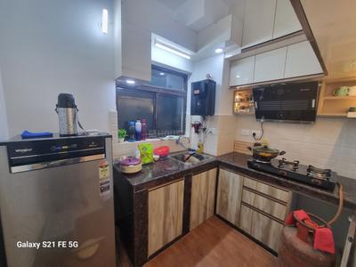Kitchen Image of 948 Sq.ft 2 BHK Apartment / Flat for sale in Signum Windflower, Madhyamgram Kolkata for Rs. 6200000