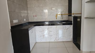 Kitchen Image of 1050 Sq.ft 2 BHK Apartment / Flat for rent in Sunbuildcon Suryansh Sanidhya Shivalaya, Sarkhej Ahmedabad for Rs. 17999