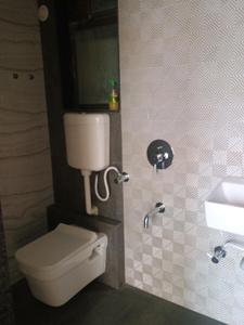 Common Bathroom Image of 600 Sq.ft 1 BHK Apartment / Flat for sale in Kalyan East Kalyan for Rs. 4100000