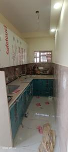 Kitchen Image of 700 Sq.ft 2 BHK Builder Floor for rent in Trivani Apartment, Jhilmil Colony New Delhi for Rs. 20000