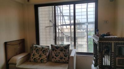 Living Room Image of 800 Sq.ft 1 BHK Apartment / Flat for sale in Ram Nagar Shanti Garden Sector 5 Bldg 9, Mira Road East Mira Bhayandar for Rs. 8000000