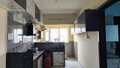 Kitchen Image of 950 Sq.ft 2 BHK Apartment / Flat for rent in Dhanashree Aanand 2, Mohammed Wadi Pune for Rs. 22000