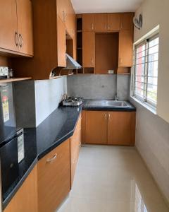 Kitchen Image of 1057 Sq.ft 3 BHK Apartment / Flat for sale in Utsa Luxury Complex, New Town Kolkata for Rs. 16500000