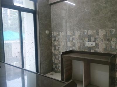 Kitchen Image of 920 Sq.ft 2 BHK Apartment / Flat for sale in Vastusankalp Punyodaya Rio, Kalyan West Kalyan for Rs. 7200000
