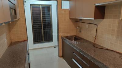 Kitchen Image of 1051 Sq.ft 2 BHK Apartment / Flat for rent in Rashi Tower, Goregaon East Mumbai for Rs. 65000