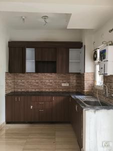 Kitchen Image of 990 Sq.ft 2.5 BHK Apartment / Flat for sale in NBCC Tropical Garden, Noida Extension Greater Noida for Rs. 7500000