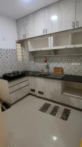 Kitchen Image of 1150 Sq.ft 2 BHK Apartment / Flat for rent in Cox Town Bengaluru for Rs. 40000