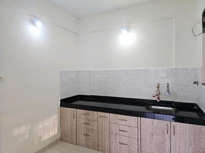 Kitchen Image of 550 Sq.ft 1 BHK Apartment / Flat for sale in Dhanori Pune for Rs. 5000000