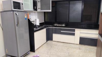 Kitchen Image of 1060 Sq.ft 2 BHK Apartment / Flat for rent in Kalash Vastushree, Katraj Pune for Rs. 23000