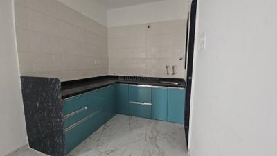 Kitchen Image of 930 Sq.ft 2 BHK Apartment / Flat for rent in Avani 12th Avenue, Vikas Nagar Pune for Rs. 26000