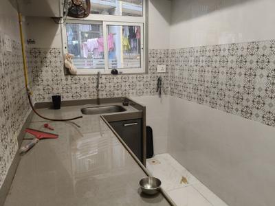 Kitchen Image of 306 Sq.ft 1 BHK Apartment / Flat for sale in HS Samarpan, Ghatkopar East Mumbai for Rs. 8000000