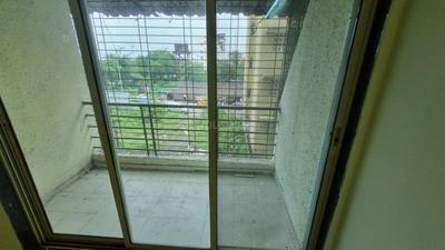 Balcony Image of 666 Sq.ft 1 BHK Apartment / Flat for sale in Laxmi Complex, Taloja Navi Mumbai for Rs. 3600000