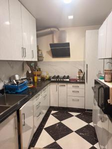 Kitchen Image of 1200 Sq.ft 2 BHK Builder Floor for rent in DDA Akshardham Apartments, Sector 19 Dwarka New Delhi for Rs. 39000