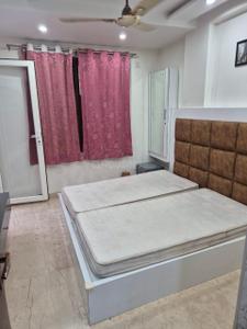 Bedroom Image of 900 Sq.ft 2 BHK Builder Floor for rent in Janakpuri New Delhi for Rs. 40000