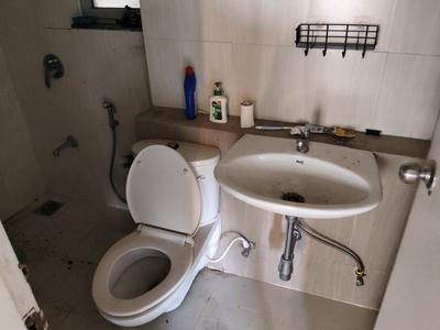 Common Bathroom One Image of 1080 Sq.ft 2 BHK Apartment / Flat for sale in Adani The Meadows, Shantigram Ahmedabad for Rs. 7100000