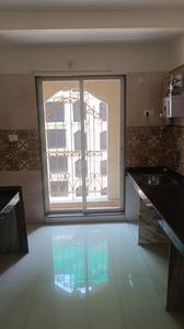 Kitchen Image of 980 Sq.ft 2 BHK Apartment / Flat for sale in Tharwani Meghna Montana Phase 3, Ambernath West Ambernath for Rs. 3900000