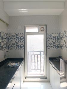 Kitchen Image of 450 Sq.ft 1 BHK Apartment / Flat for rent in Raunak Bliss, Kasarvadavali Thane for Rs. 26245