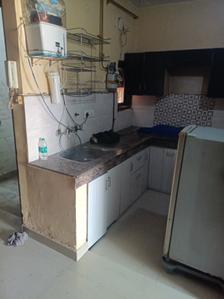 Kitchen Image of 1500 Sq.ft 2 BHK Builder Floor for rent in Dwarka Mor New Delhi for Rs. 14000