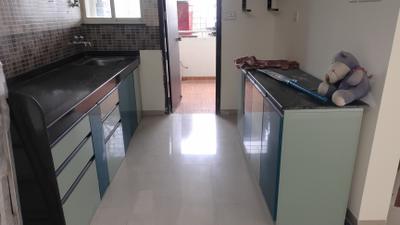 Kitchen Image of 1350 Sq.ft 3 BHK Apartment / Flat for rent in Gini Bellissimo, Dhanori Pune for Rs. 31000