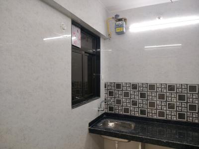 Kitchen Image of 700 Sq.ft 1 BHK Apartment / Flat for rent in Raunak Bliss, Kasarvadavali Thane for Rs. 15501