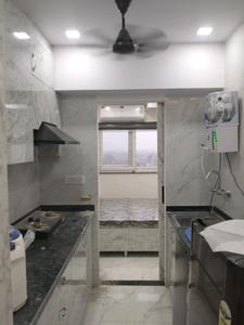 Kitchen Image of 370 Sq.ft 1 RK Apartment / Flat for rent in DLF Capital Greens, Karampura New Delhi for Rs. 24000