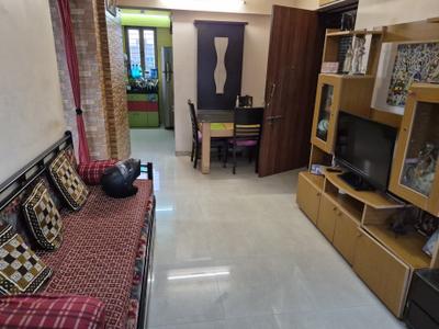 Living Room Image of 927 Sq.ft 2 BHK Apartment / Flat for sale in Swaraj Planet, Kopar Khairane Navi Mumbai for Rs. 13500000