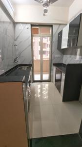Kitchen Image of 900 Sq.ft 1 BHK Apartment / Flat for sale in Mohan Precious Greens Phase III, Ambernath East Ambernath for Rs. 5000000